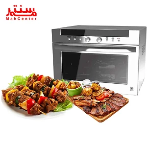 تصویر یک فر نقره‌ای مدرن در کنار بشقابی از کباب‌های رنگارنگ و خوشمزه و تخته‌ای شامل گوشت گریل شده، سبزیجات و ذرت، با لوگوی "Mah Center" در گوشه بالا سمت چپ.